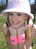 Kitty is outdoors lifting her skirt exposing her yummy shaved beaver!